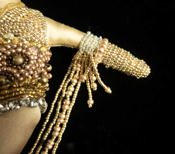 Beaded Doll with Gold Colored Beads