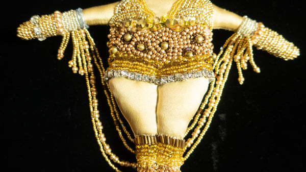 Beaded Doll with Gold Colored Beads