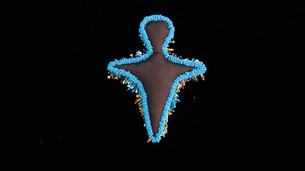 Beaded Doll with Turquoise Colored Glass Beads